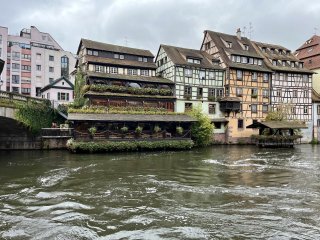 A row of pretty houses right on the riverbank.