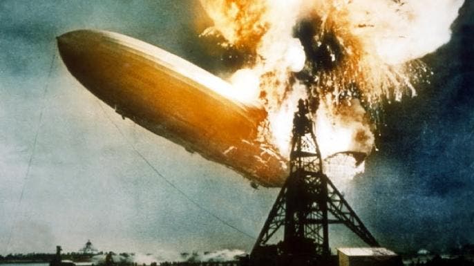 The Hindenburg bursts into blames above Lakehurst, New Jersey, on May 6, 1937.