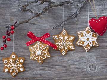 Snowflake gingerbread cookies on wooden background online puzzle