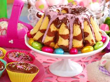 Babka with chocolate icing on Easter table puzzle online from photo