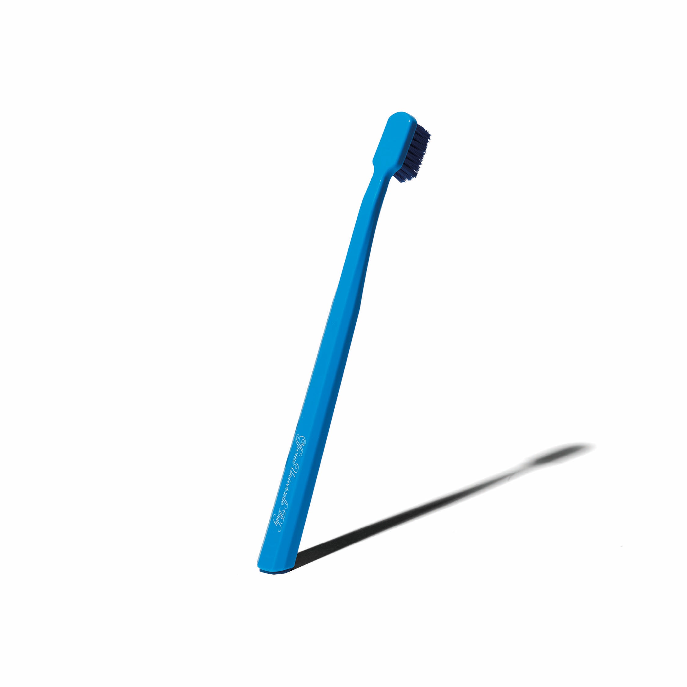 Blue Curaprox toothbrush