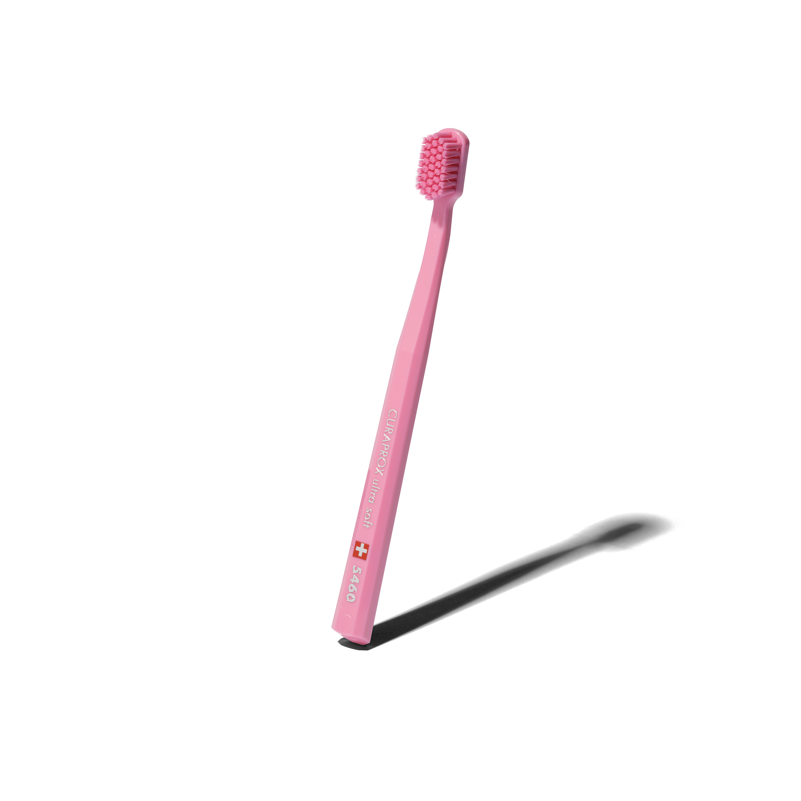 Pink Curaprox toothbrush