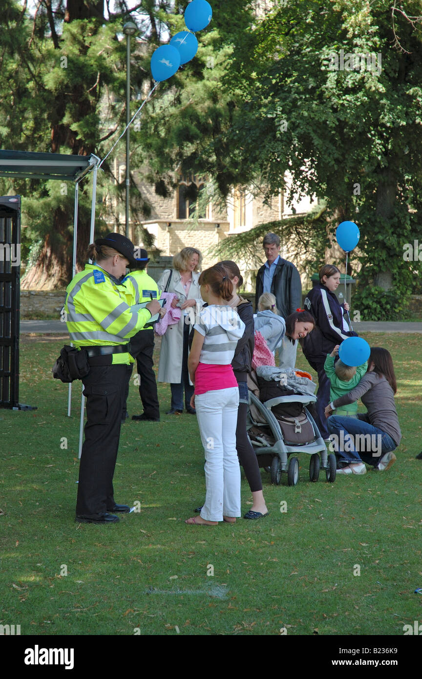 PCSO talking to young people Stock Photo