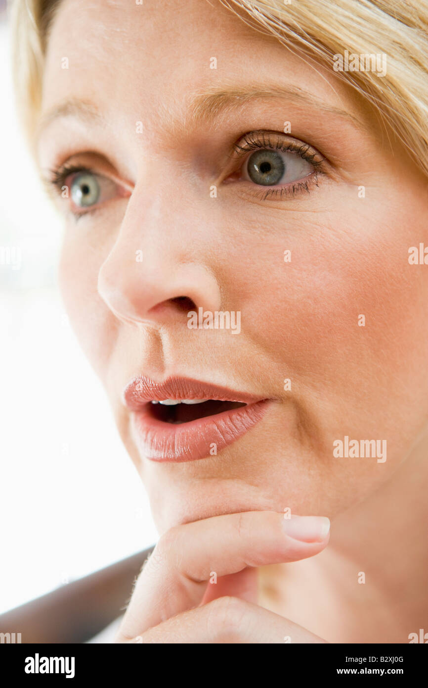 Head shot of woman thinking Stock Photo