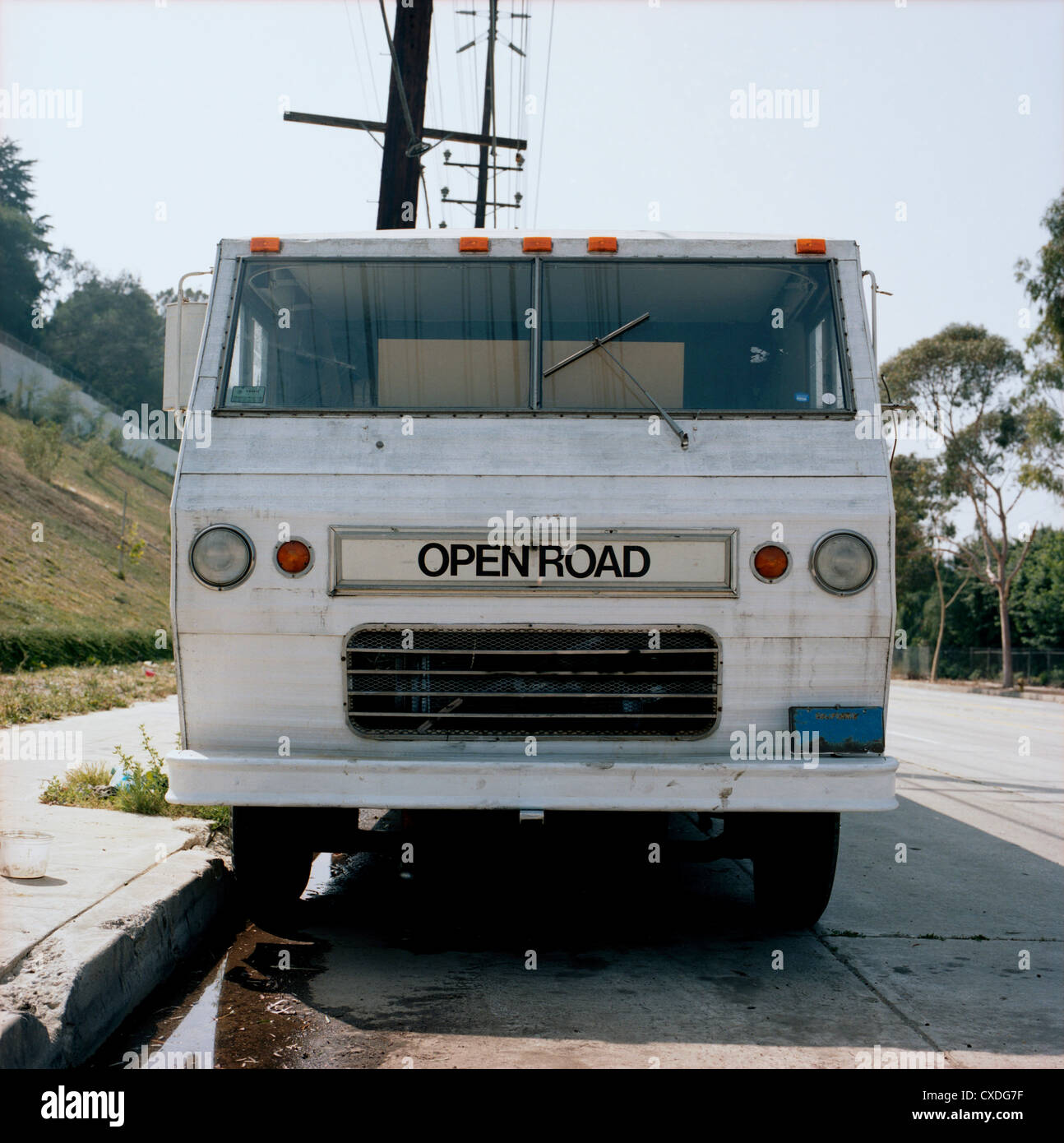 RV parked on roadside Stock Photo