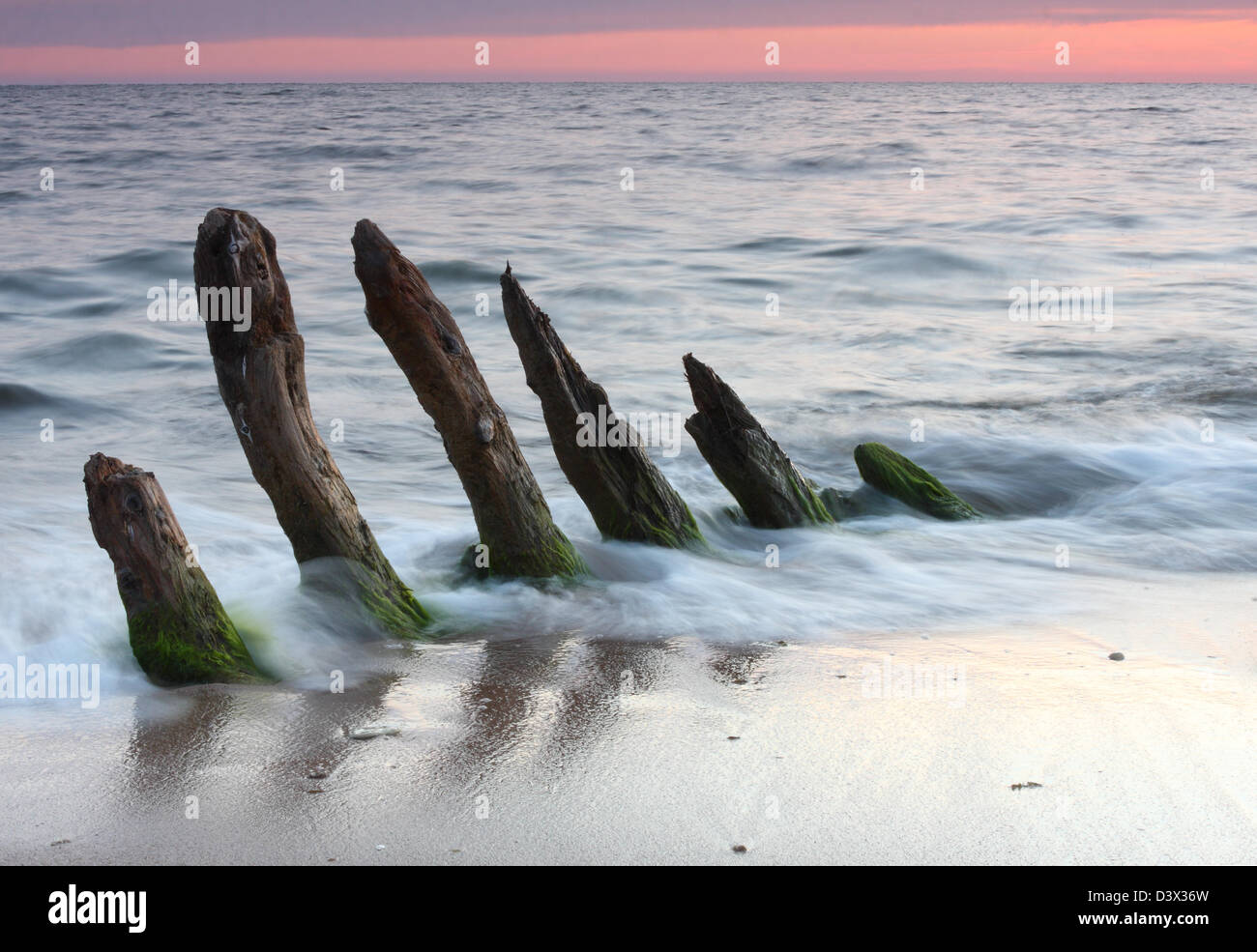 Old ship wreck on the beach Stock Photo