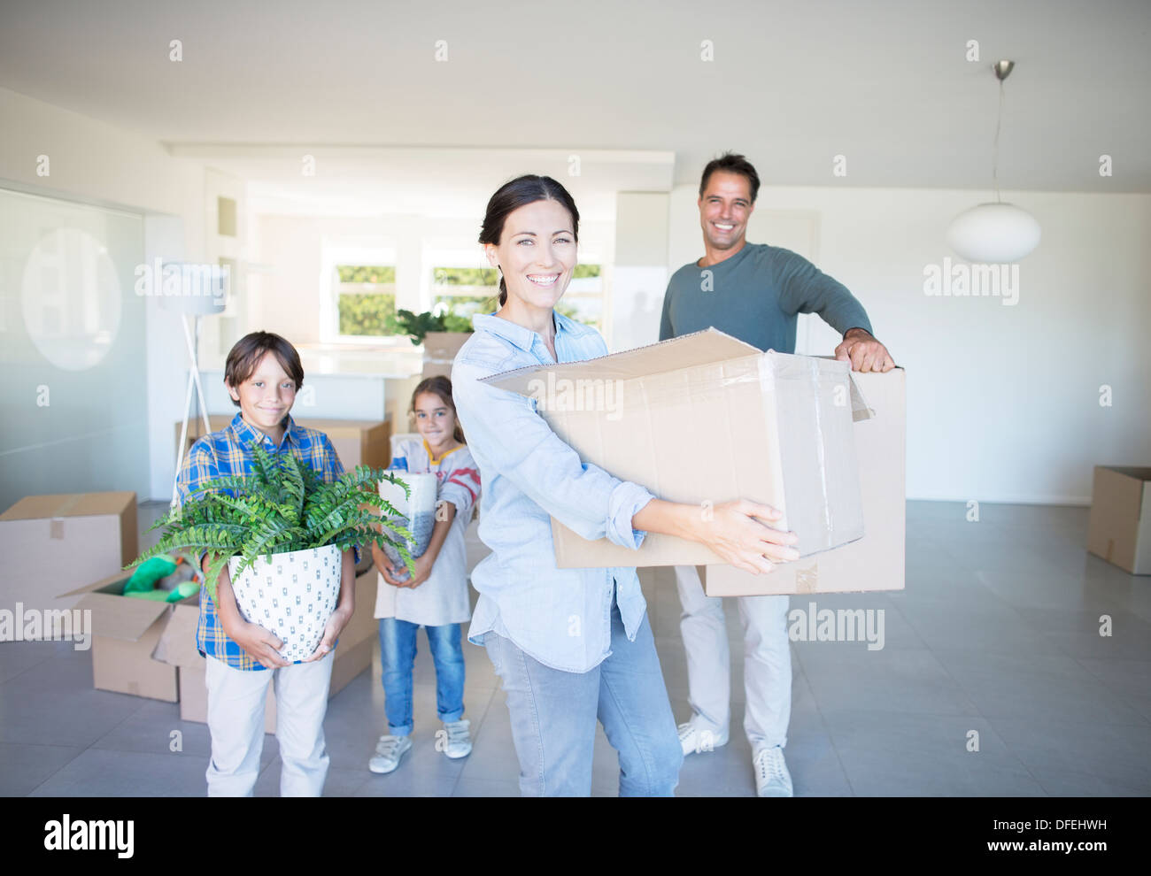 Family moving into new house Stock Photo