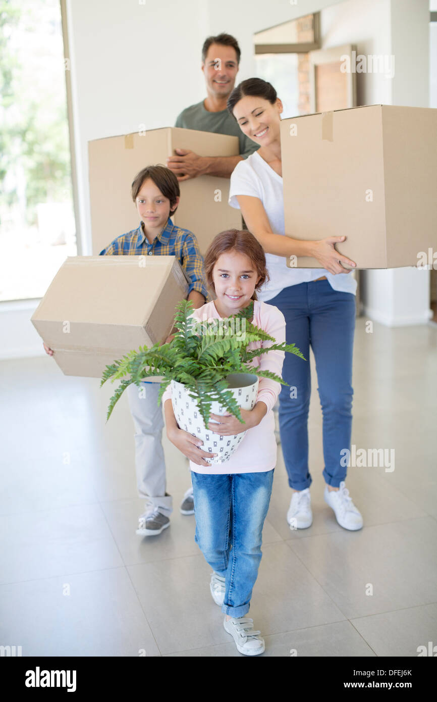 Family moving into new house Stock Photo