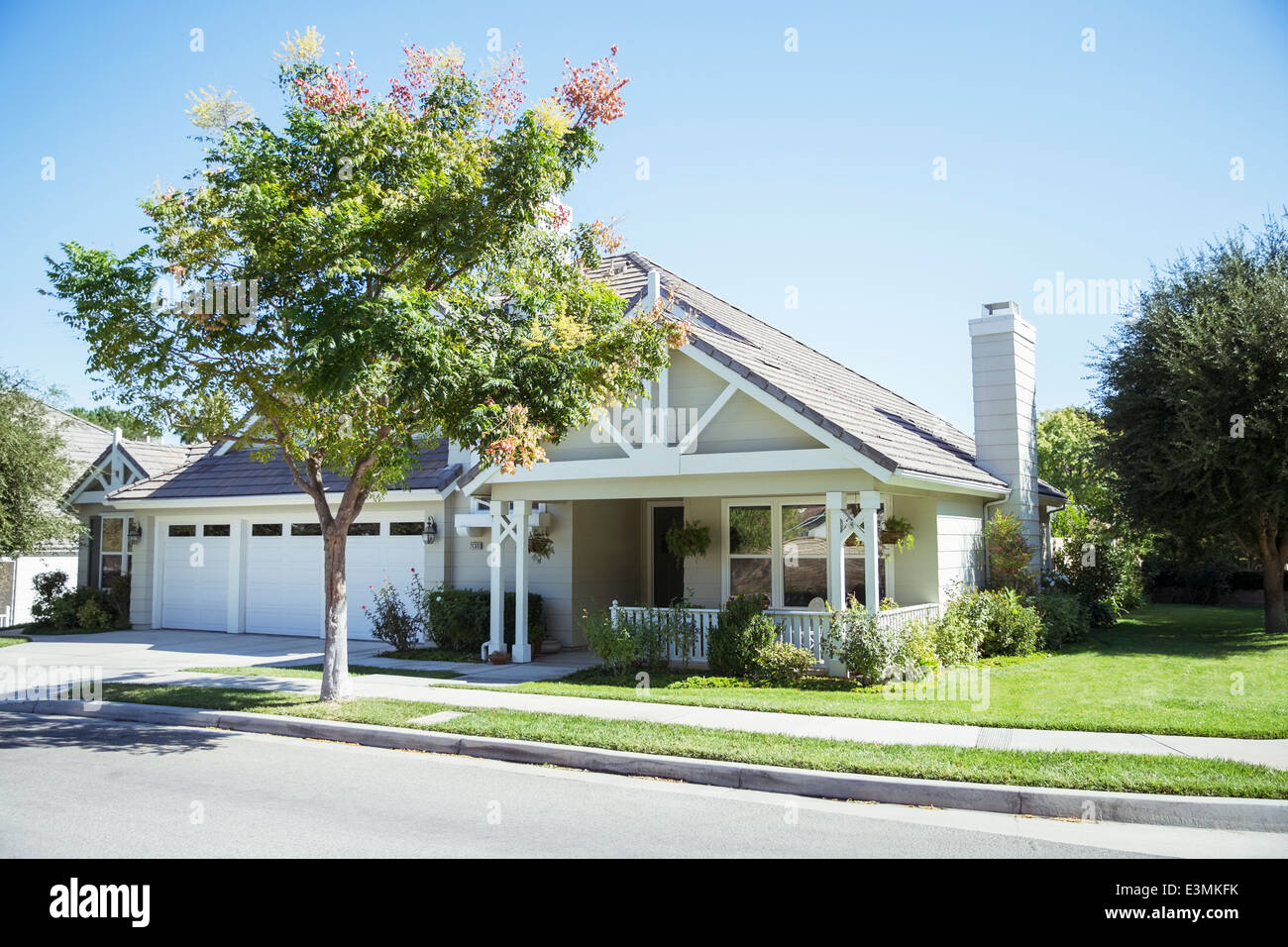 Sunny house and yard Stock Photo