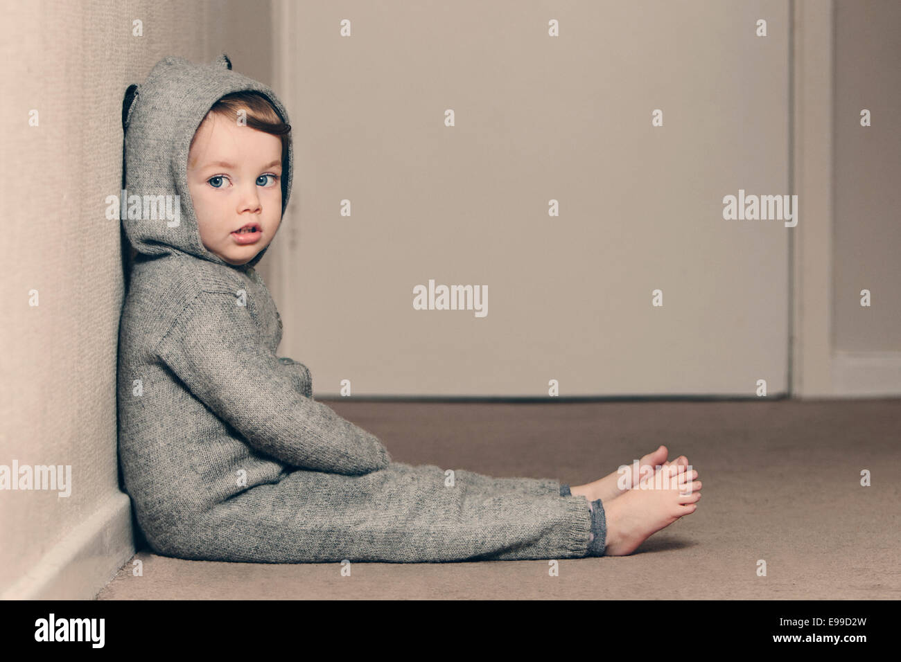 Cute Child in Onesie Stock Photo