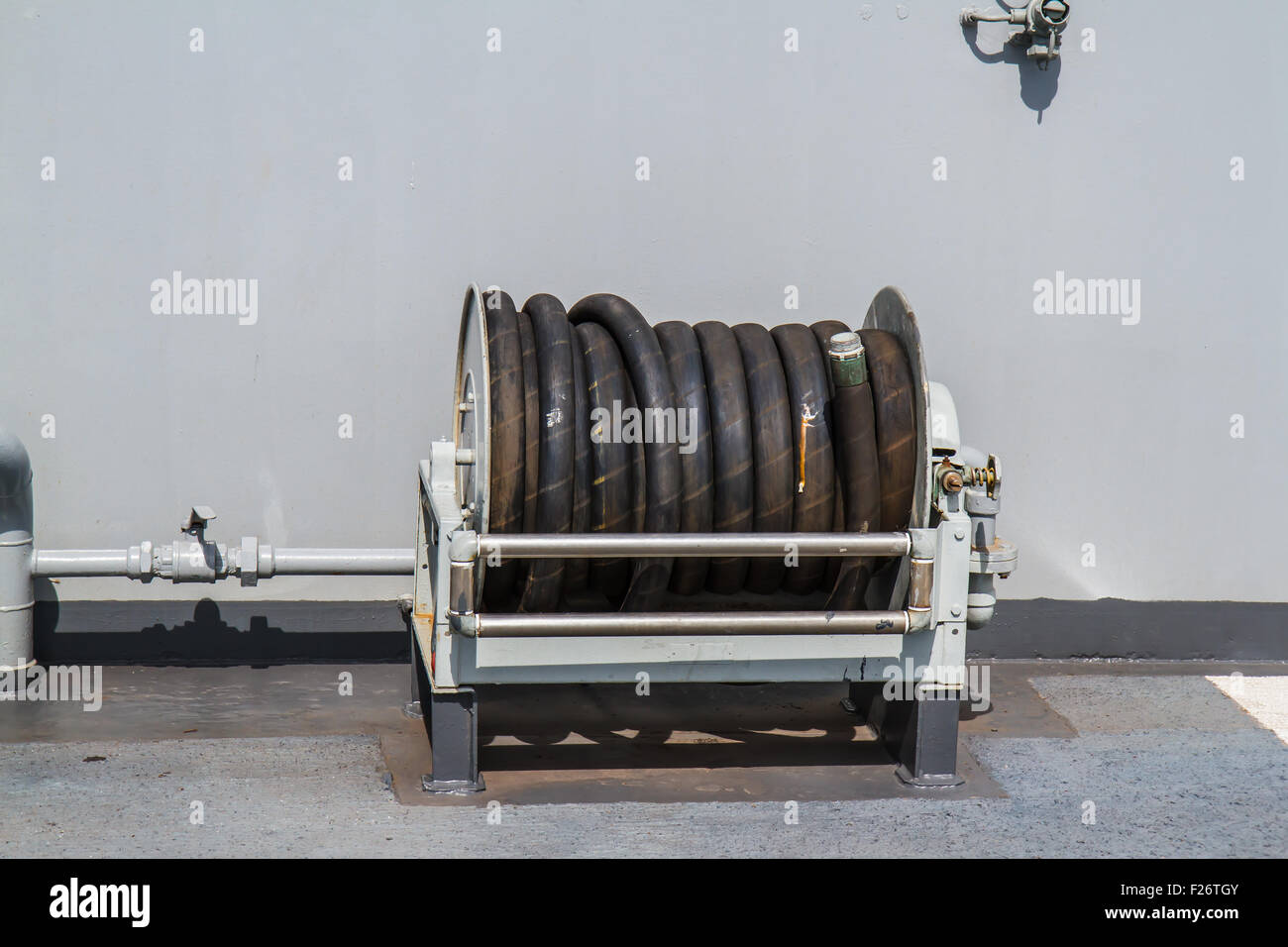 Firehose in battleship Stock Photo