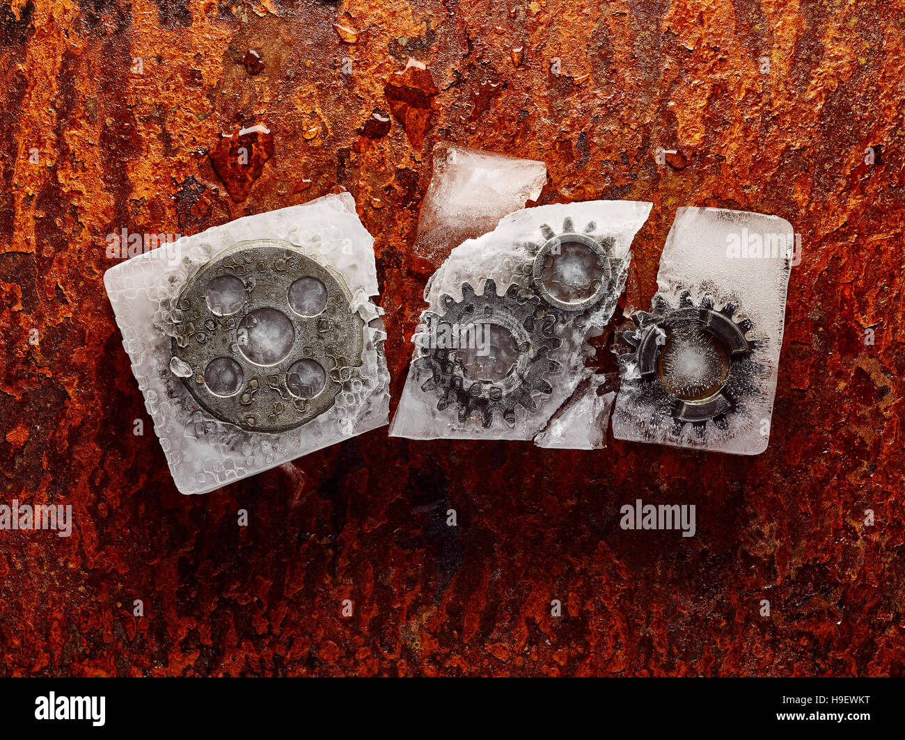 Gears frozen in broken ice Stock Photo