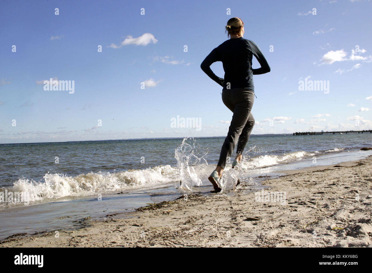 Young woman, sporty, beach, run Stock Photo