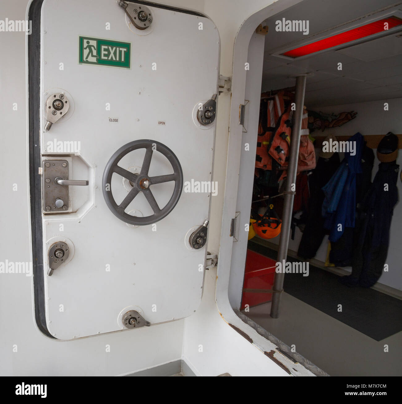 Open white door of a ship Stock Photo