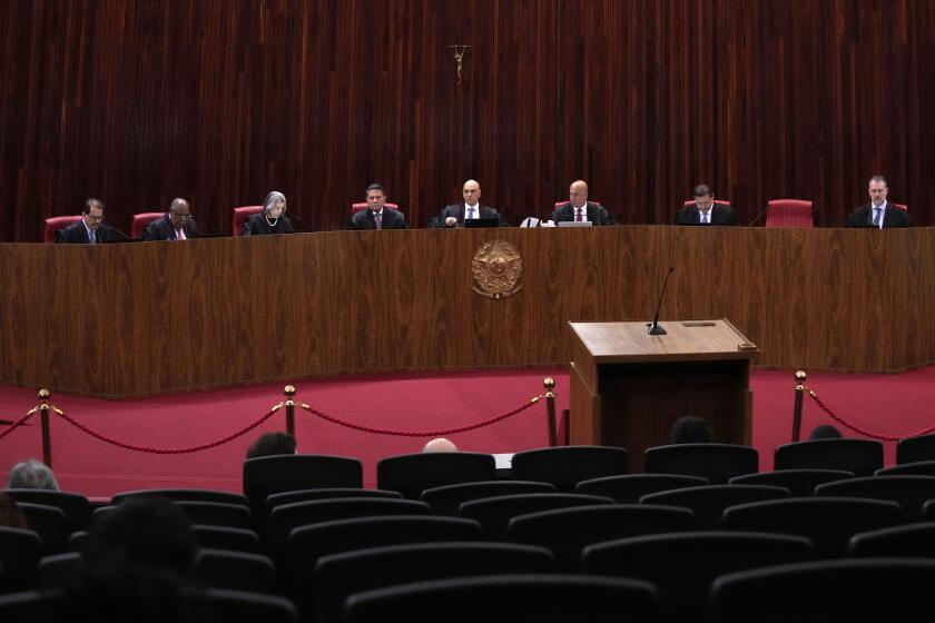 FILE - Supreme Court justices preside over a trial in Brasilia, Brazil, June 30, 2023. Brazil’s Supreme Court on Tuesday, June 25, 2024, moved toward decriminalizing possession of marijuana for personal use. (AP Photo/Eraldo Peres, File)