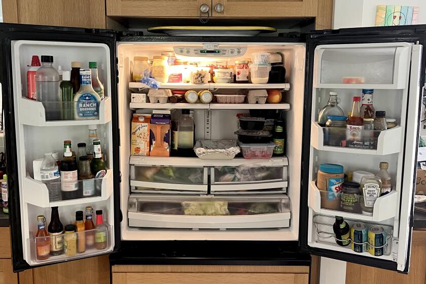 Columnist Robin Abcarian's un-fridgescaped refrigerator. Abcarian explores one of the current fads is for "fridgescaping," where you apply your interior design skills to the inside of your fridge -- you know, like arranging fruit in tasteful bowls.