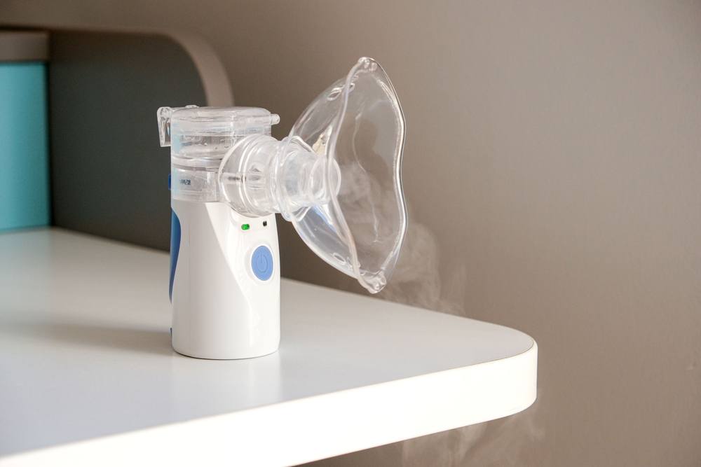 Oxygen mask nebulizer