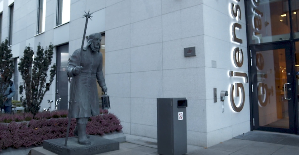 A statue outside of the Gjensidige building