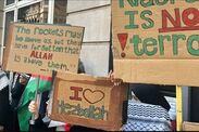 pro palestine protests london i love Hezbollah placards