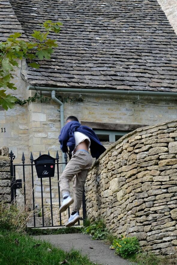 brit-tourists-climb-over-walls-jump-over-garden-fences-quaint-uk-village