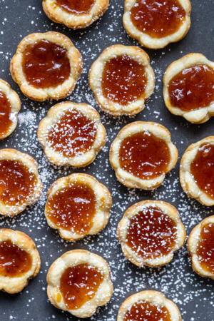 Jam Tarts with powders sugar.