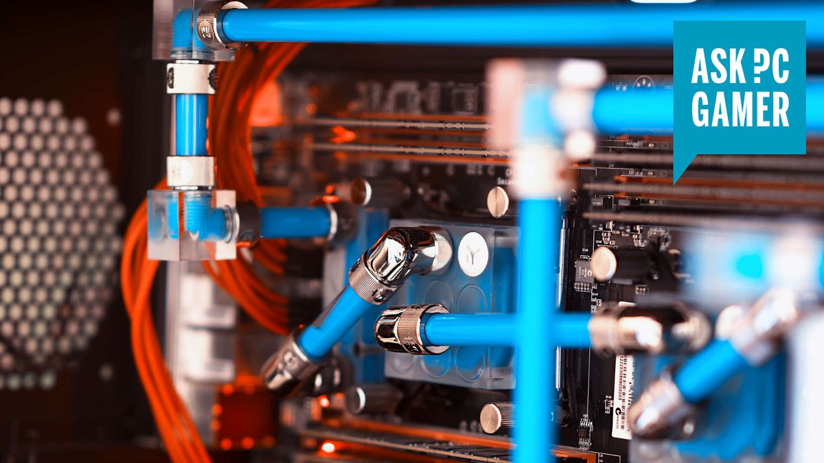 Liquid-cooled PC interior with blue liquid in pipes