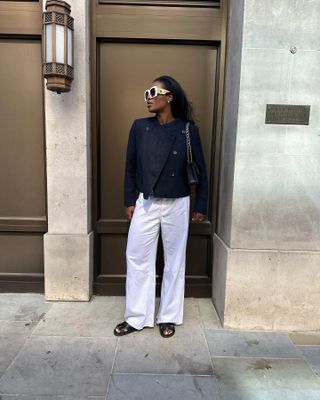 Influencer wears Hermes Oran Sandals