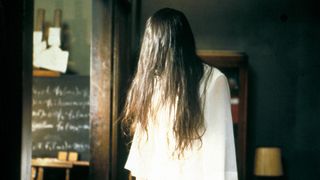 Rie Inō as Sadako Yamamura in the horror movie ringu.