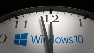 Windows 10 logo on a clock close to striking midnight.