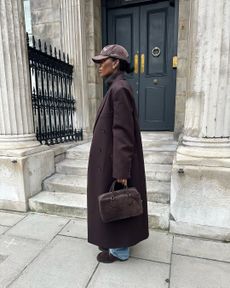 woman wearing all brown outfit with loafers