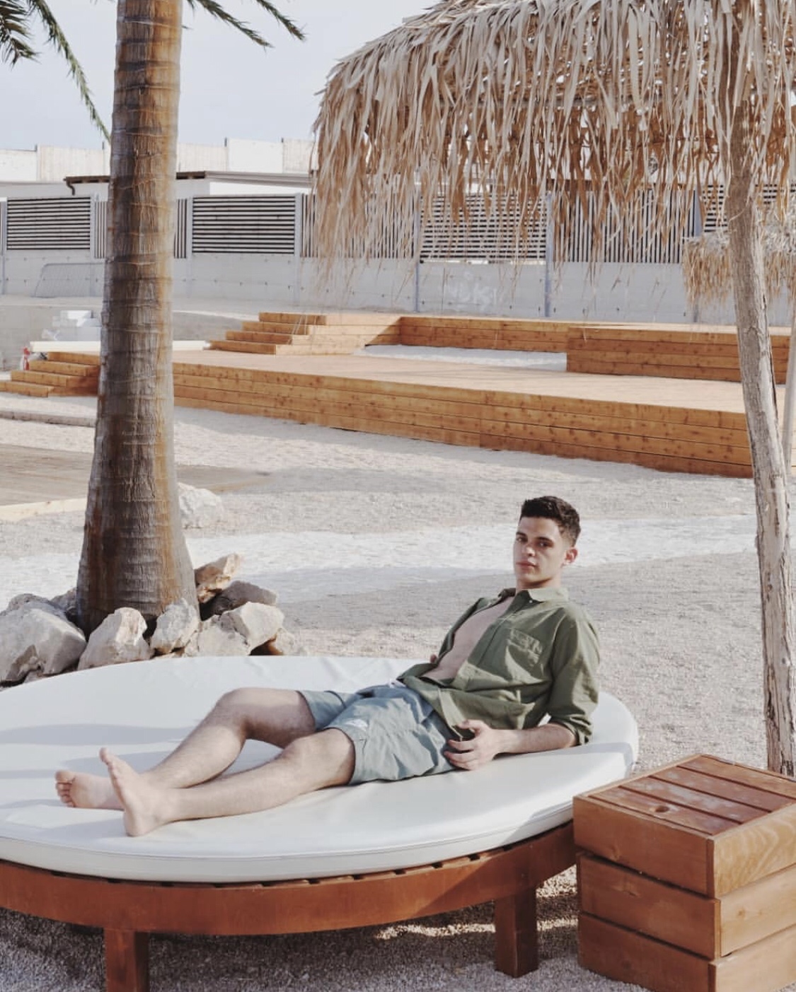 Fedspacekid barefoot on the beach