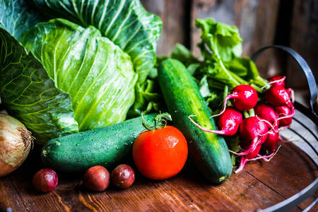 Fresh vegetables on a wooden tray