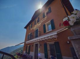 Osteria Manciana con Alloggio MONTE GENEROSO, hotel en Scudellate