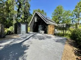 Cosy holiday home in a wooded area in Lochem