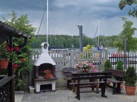 Domek przy promenadzie, hotel a Mikołajki