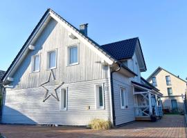 Lütt Hus an de See Ferienwohnung, hotel en Niendorf