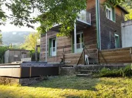 Maison au bord de l'eau avec Jacuzzi