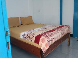 OYO 93359 Kawi Homestay, hotel i Praya