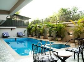 Ariena by Spree Hotels Goa, hotel en Morjim