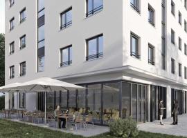 Munique Hotel München, готель у місті Унтершляйсгайм