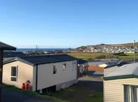 Experience Coastal Bliss in Our Fresh 2019 Sea Viev 2 Bedroom static caravan at Clarach Bay Holiday Village!