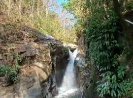 Private waterfall and indigenous house!