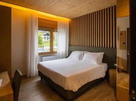 Chalet Cridola Dolomiti Experience โรงแรมในLorenzago