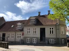 Huset ved springvandet