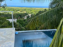 Casa vista al mar y las montañas río san Juan a solo 4 minutos de centro del pueblo y las playas, hotel u gradu 'Río San Juan'