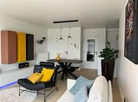 BD Appartement - Modern en gezellig - Strand en winkels vlakbij