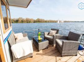 WOHLFÜHLBOOT Hausboot - Festlieger im Hafen Bad Saarow - WC an Bord, Dusche an Land, hotel en Bad Saarow