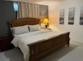 Licensed spacious basement suite with one king-size bed