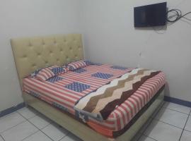 OYO 94212 Home Stay Syariah Annur, готель у місті Кунінґан