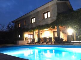 Casa da Lomba Piscina y vistas al mar en Baiona, מלון בבאיונה